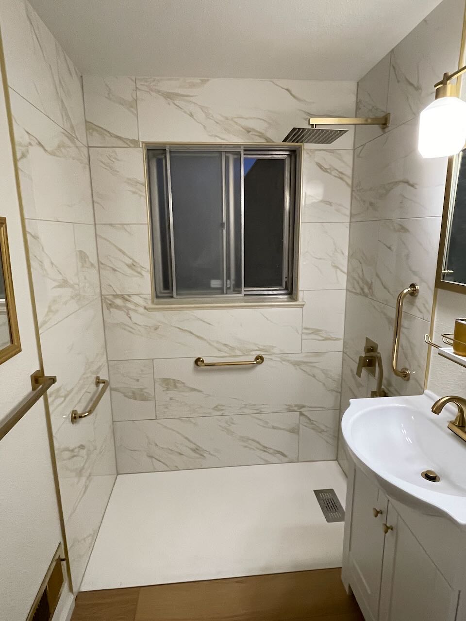 Before picture of out dated bathroom with no storage