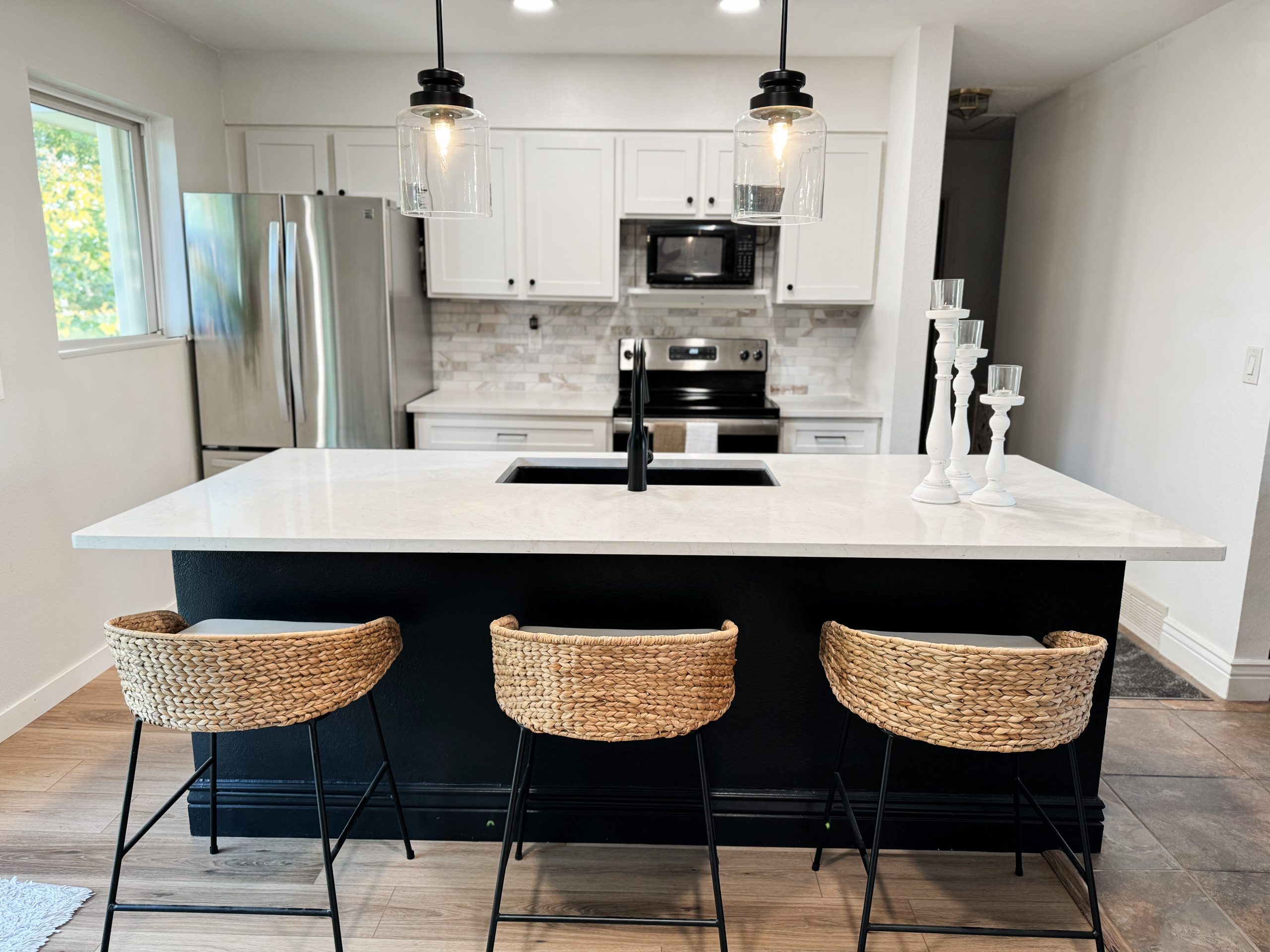 New white cabinets, quartz countertops and LVP flooring